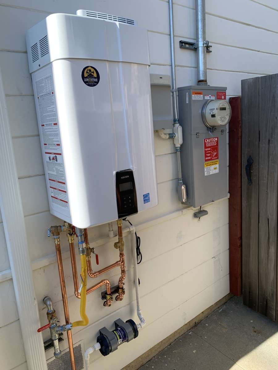 Tankless water heater with new copper and gas lines