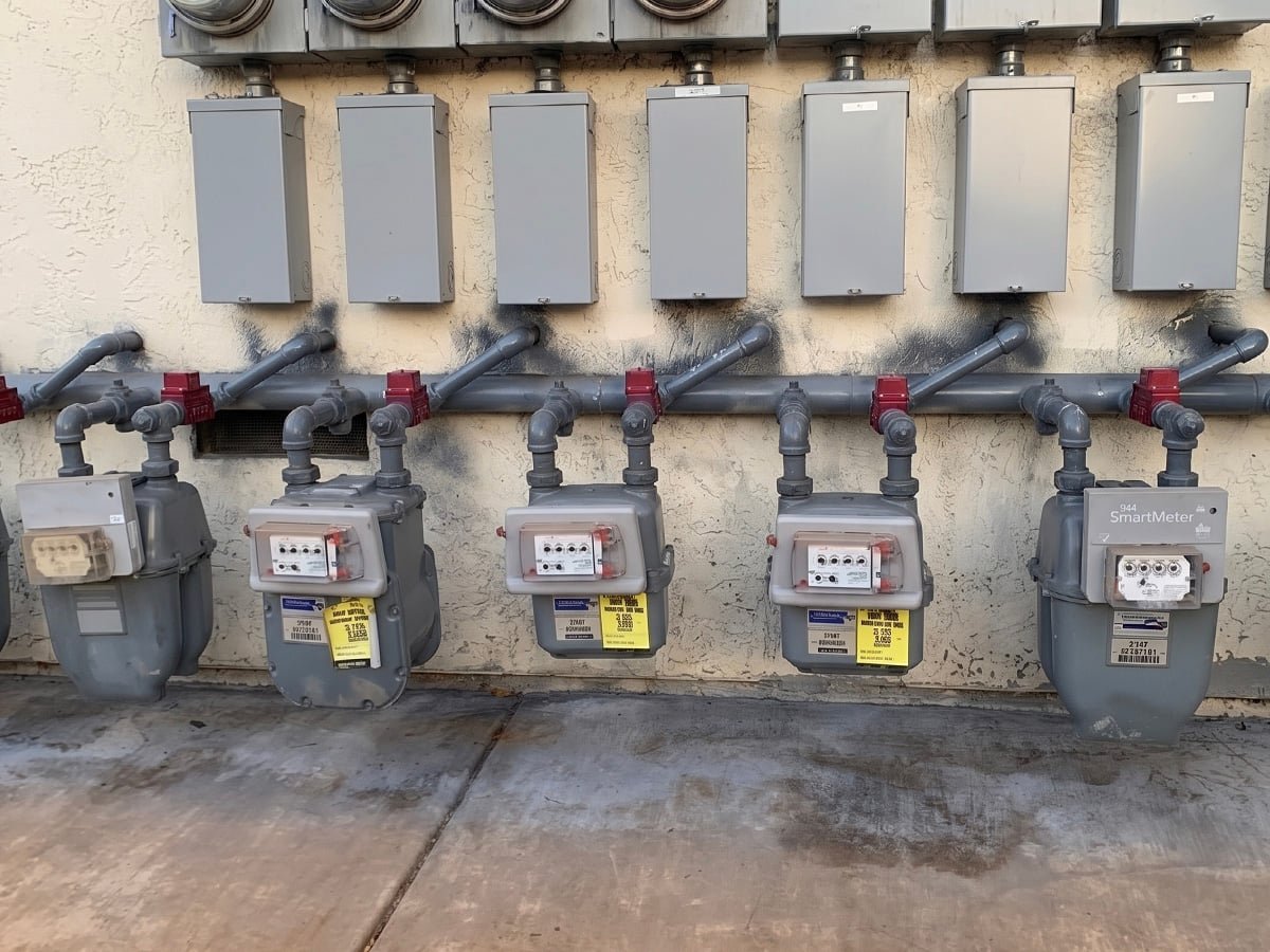 Row of gas meters with new piping