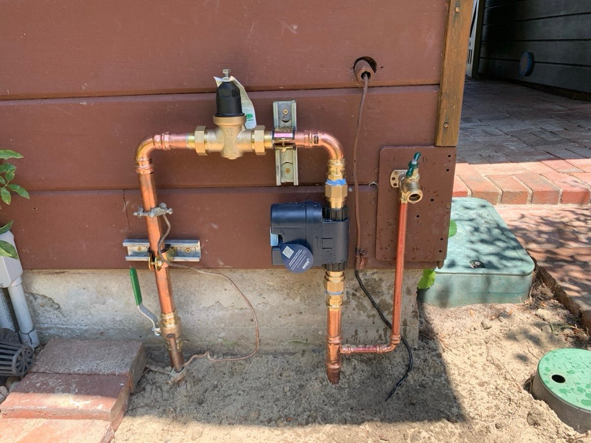 Copper main with pressure regulator